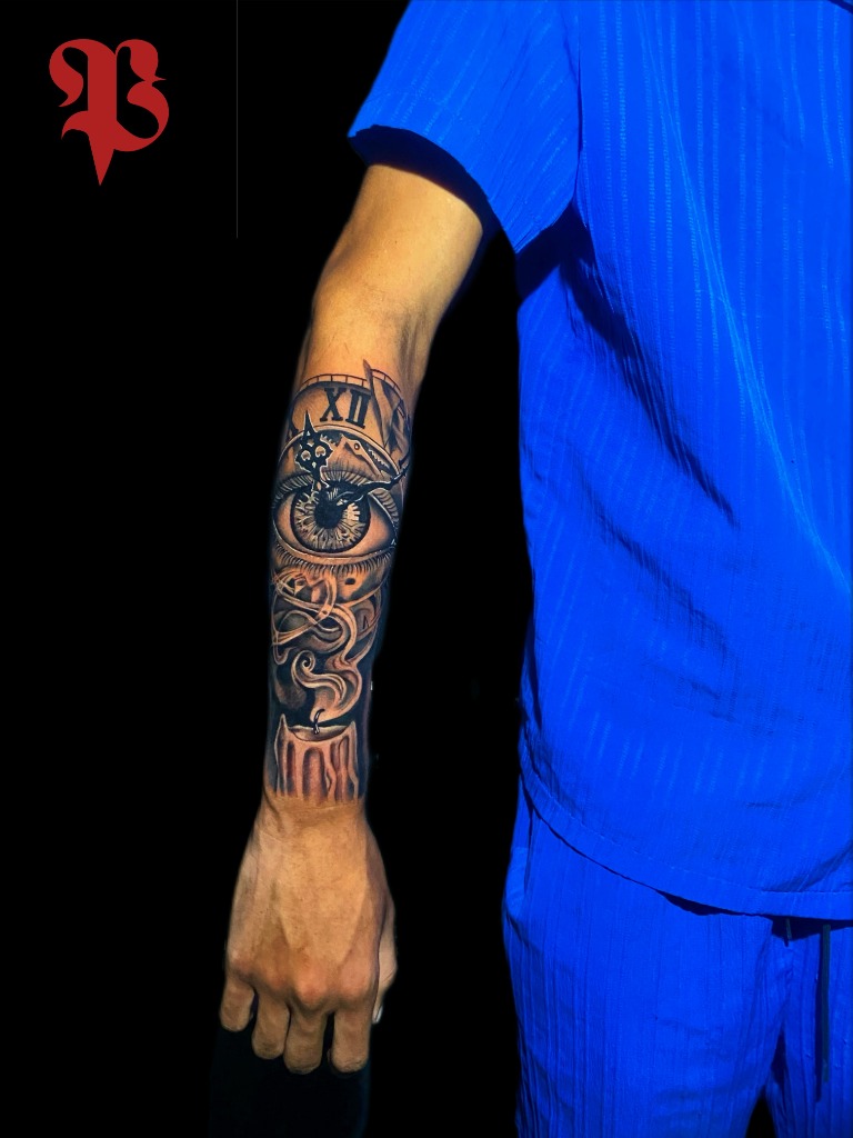 Antebrazo — Ojo del Tiempo, Reloj & Vela